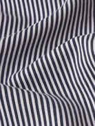 Close-up of navy and white striped fabric texture
