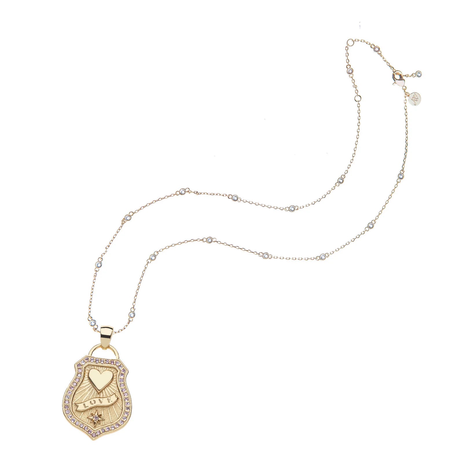 Gold necklace with a heart-shaped pendant on a white background