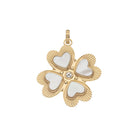 Gold pendant with heart designs on a white background