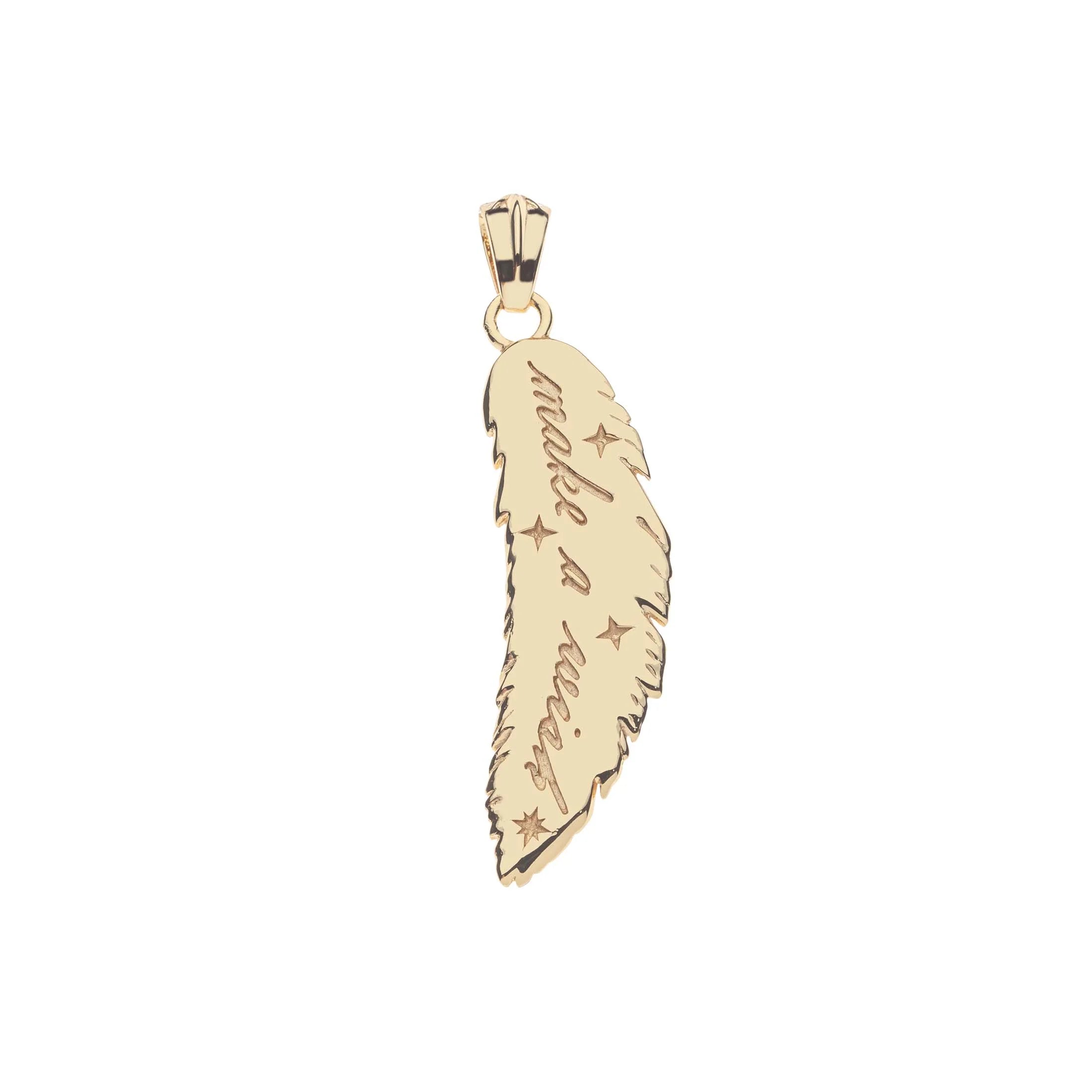 A gold feather pendant charm with a textured baroque-style feather design and a v3 word phrase down the center, shown on a plain white background.