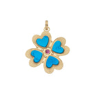 Gold pendant with blue heart-shaped stones and a pink gem on a white background
