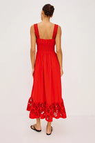 Red dress with floral hem on a white background
