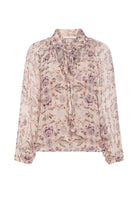 Floral patterned blouse on a white background