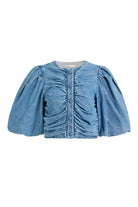 Blue denim jacket with puff sleeves on a white background