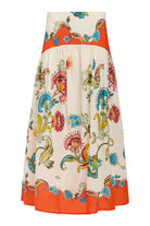 Floral patterned skirt with orange trim on a white background