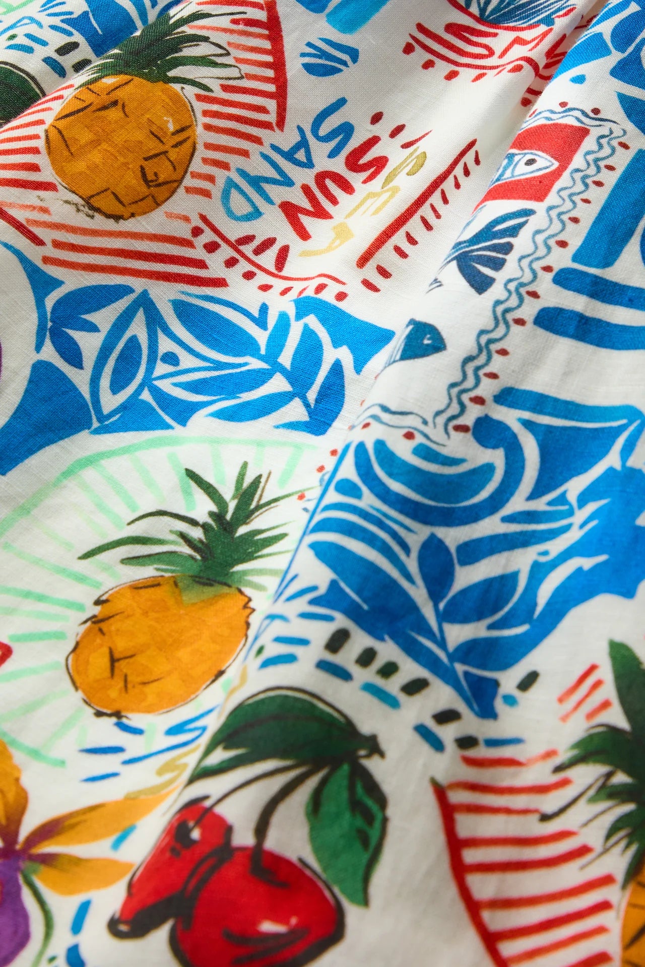colorful patterned shorts on a plain background
