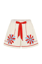 Beige shorts with red and blue floral patterns on a white background
