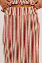 Multicolored striped skirt with a plain background