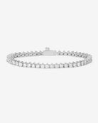 Silver bracelet with clear stones on a white background
