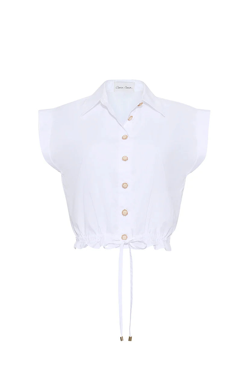 White sleeveless blouse with buttons on a white background