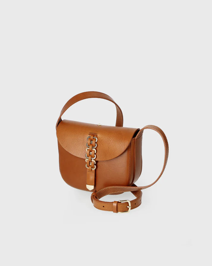 Brown leather handbag with a chain detail on a light gray background
