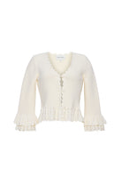White cardigan with lace details on a white background