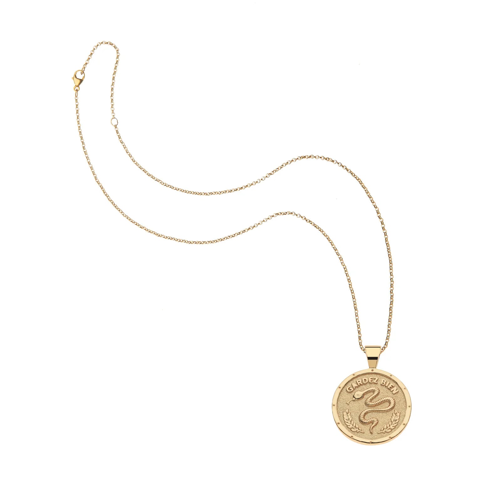 Gold necklace with a round pendant on a white background