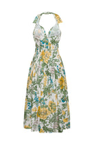 Floral dress with yellow and green flowers on a white background