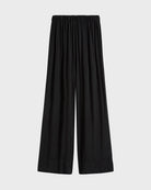 Black wide-leg pants on a light gray background