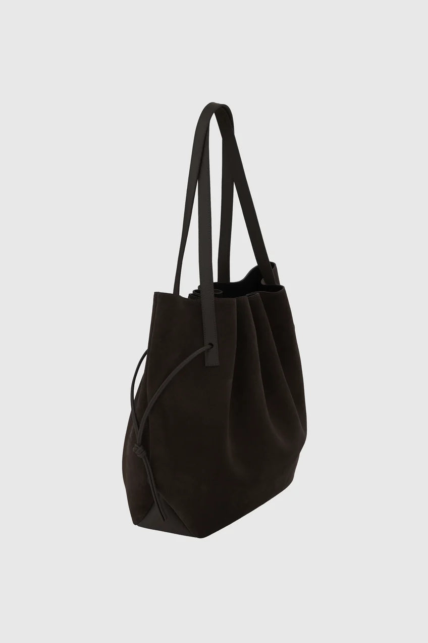 Black tote bag on a light gray background
