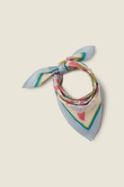 Colorful scarf with floral pattern on a beige background