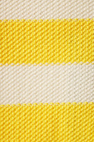 Close-up of fabric with yellow and beige stripes