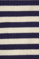 Close-up of a fabric with navy and white horizontal stripes.