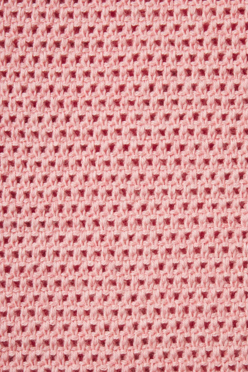 Close-up of pink textured fabric pattern