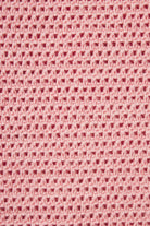 Close-up of pink textured fabric pattern