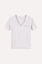 White ribbed knit v-neck sweater on a white background