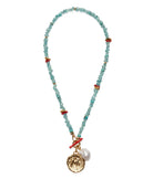 Necklace with beads and charms on a white background