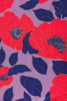 Pattern of red flowers with blue leaves on a purple background