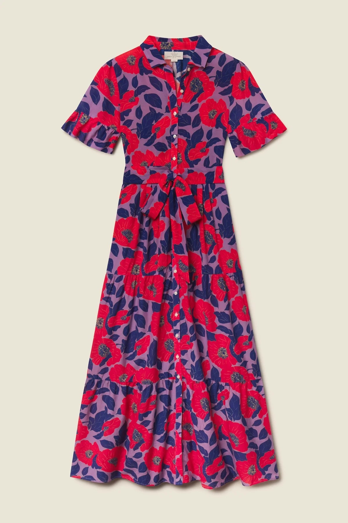 Purple and red floral dress on a beige background
