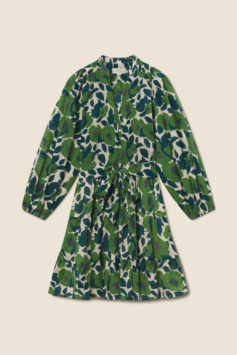 Green floral dress on a beige background