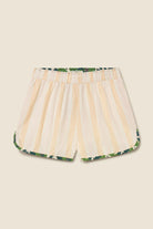 Striped shorts with a floral pattern on a beige background
