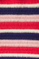 Close-up of red, white, and blue striped fabric texture