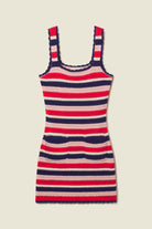 Striped dress with red, blue, and beige colors on a beige background