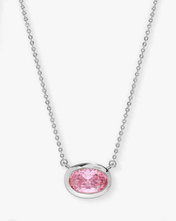 Necklace with a pink gemstone pendant on a white background