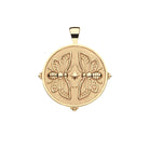 Gold pendant with butterfly design on a white background