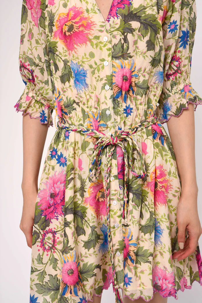 Floral dress with colorful pattern on a plain background