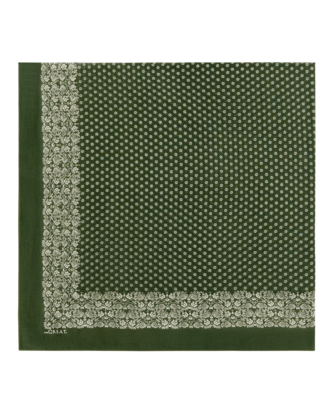 A dark green square scarf with a repeating small white geometric pattern and a decorative border, folded into a square shape on a plain white background.