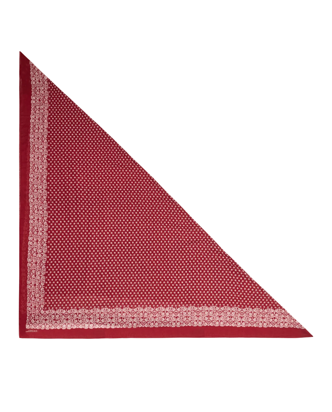 A folded red square scarf or handkerchief with a small white geometric pattern and a decorative border, displayed on a solid white background.
