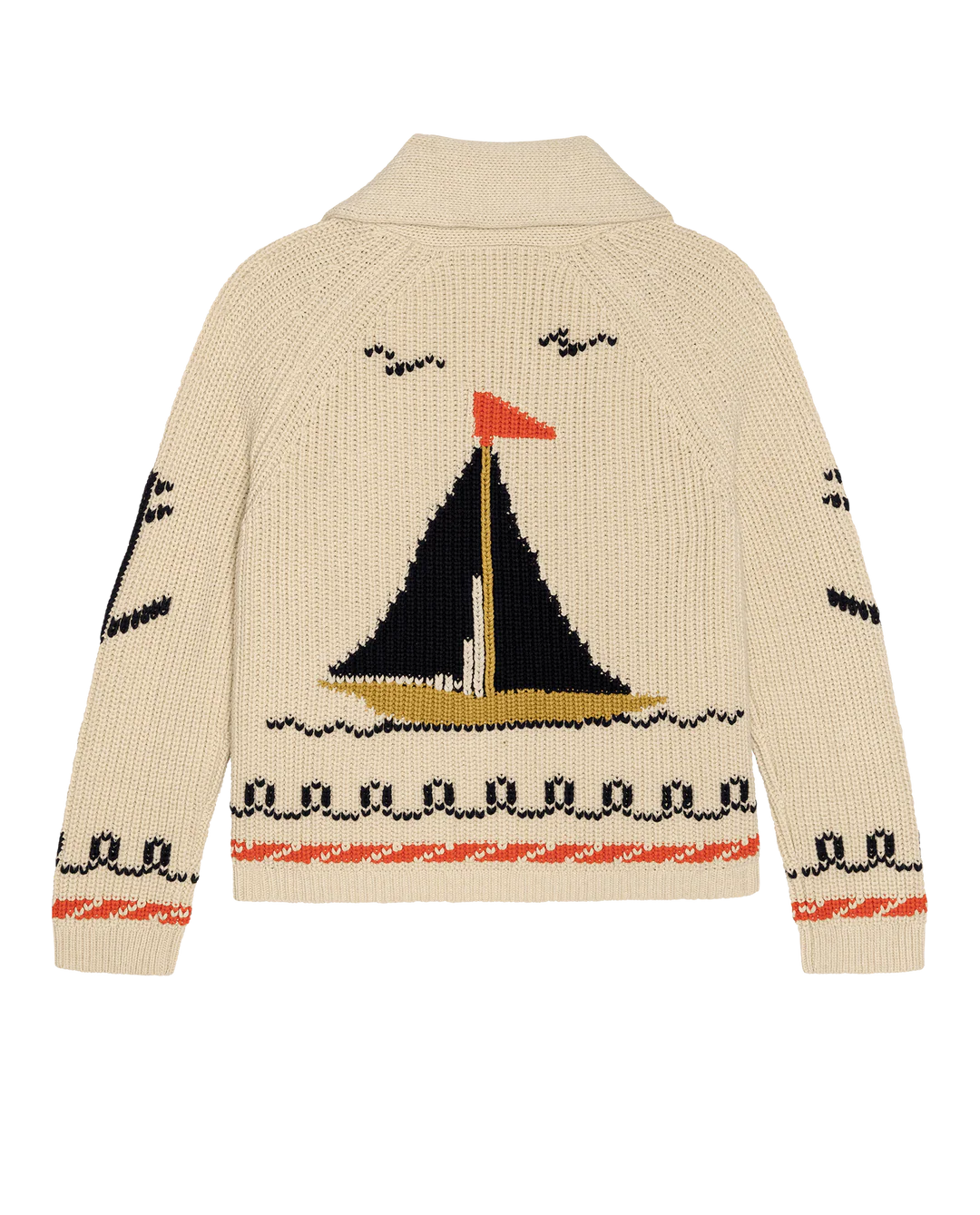 Knitted sweater with sailboat design on a white background