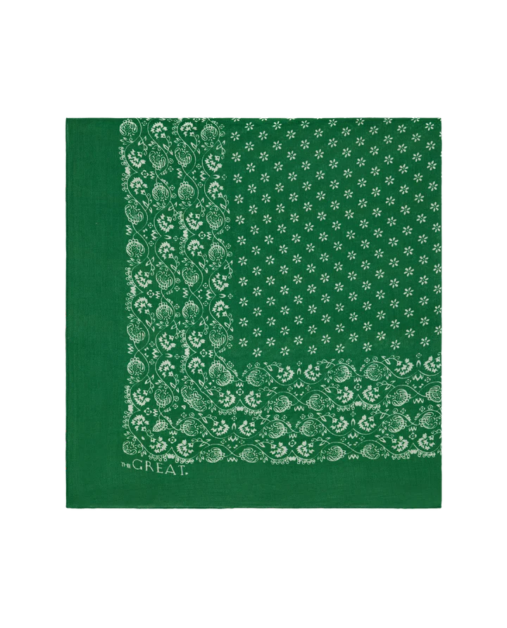 Green bandana with white pattern on a white background
