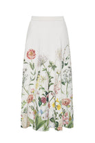 white skirt with florals and a white background