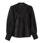 Black blouse with puffed sleeves on a white background