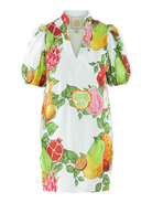 Dress with colorful fruit pattern on a white background