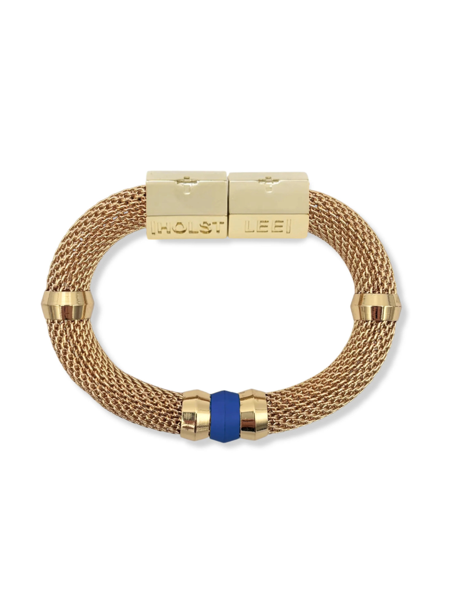 Gold bracelet with blue accent on a white background