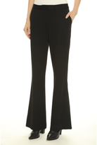Black flared trousers with a button-front waistband, modeled on a person against a plain white studio background.