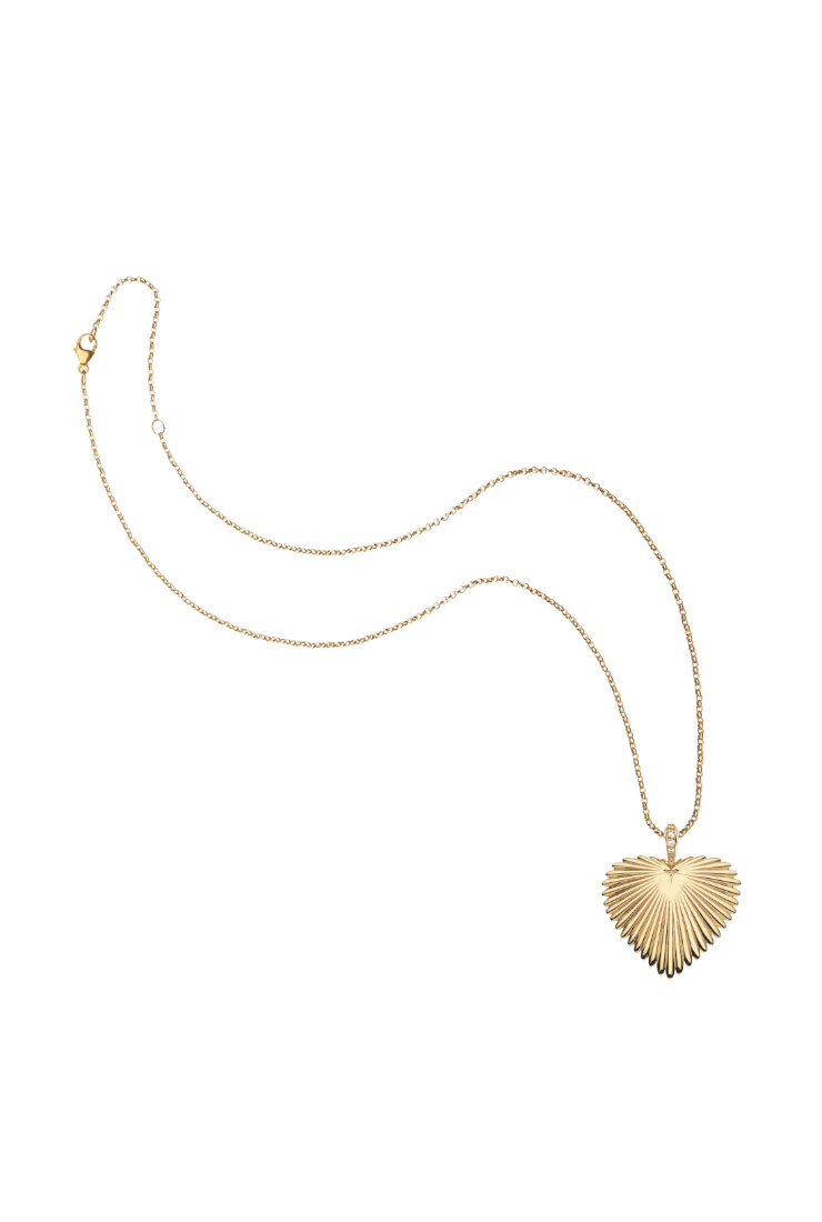 A delicate gold chain necklace featuring a textured, fan-like heart-shaped pendant, displayed against a solid white background.