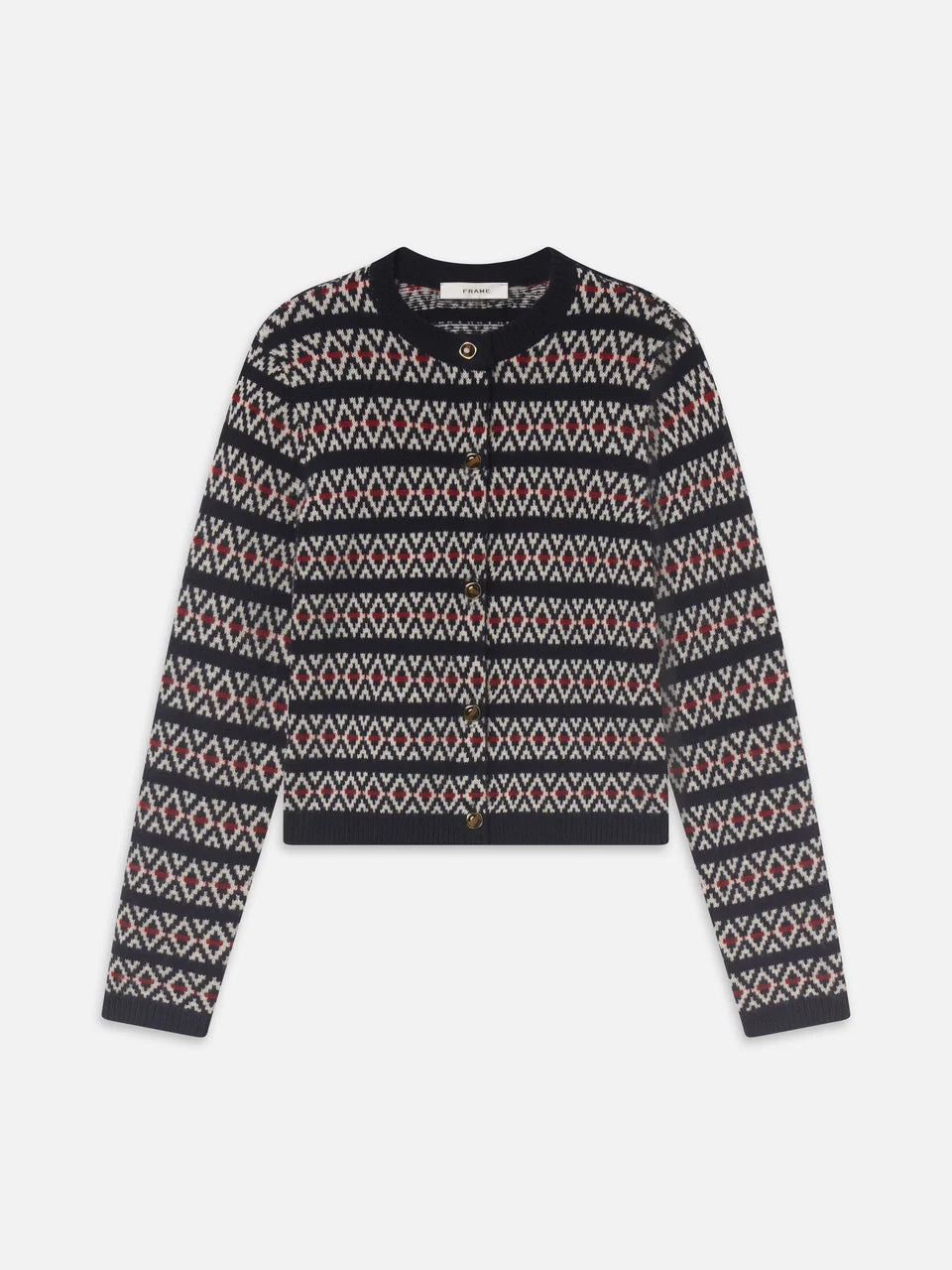 A cropped knit cardigan with a geometric Fair Isle pattern in navy, cream, and red, featuring a crew neck and button closure.