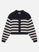 Navy and white striped cardigan on a light gray background