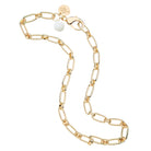 Gold chain bracelet with a white pearl on a white background
