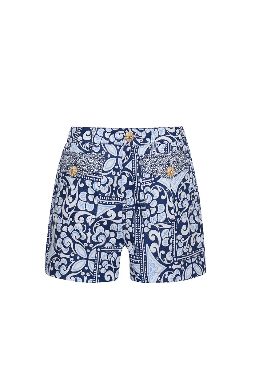 Blue patterned shorts on a white background